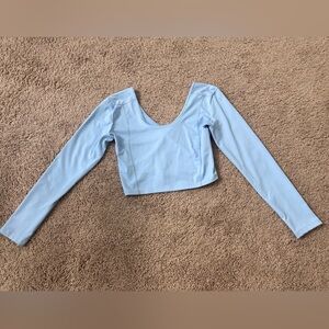 Athletic tops from Amazon in pink and light blue